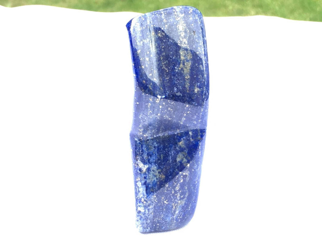 Royal Blue Lapis lazuli naturally shaped sculpture 255 grams 10x4x3cm